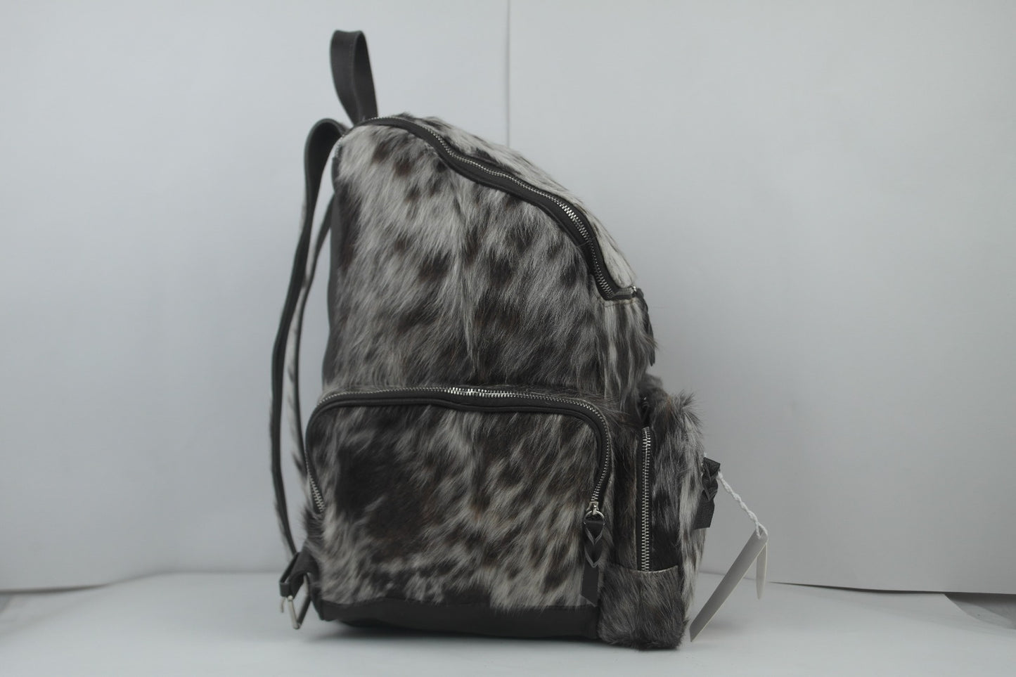 Natural Cowhide Backpack: Made with Hair-On Cow Skin