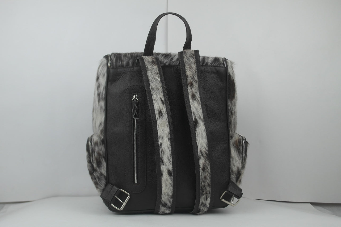 Natural Cowhide Backpack: Made with Hair-On Cow Skin