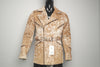 A multicolored, cowhide leather jacket with long sleeves, displayed on a mannequin. The jacket features a belt and has a textured design.