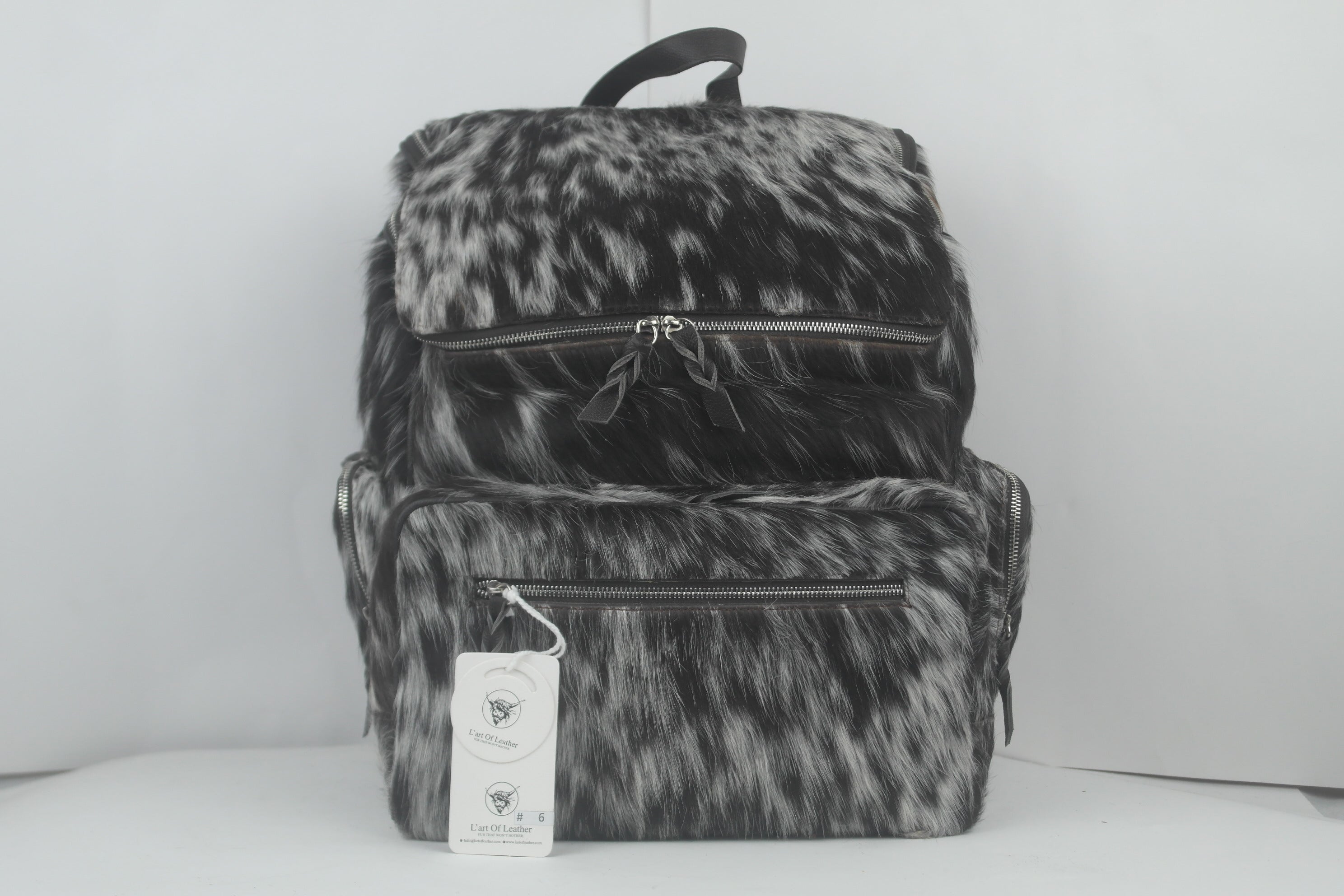 Sleek Cowhide Leather Backpack – Stylish & Functional