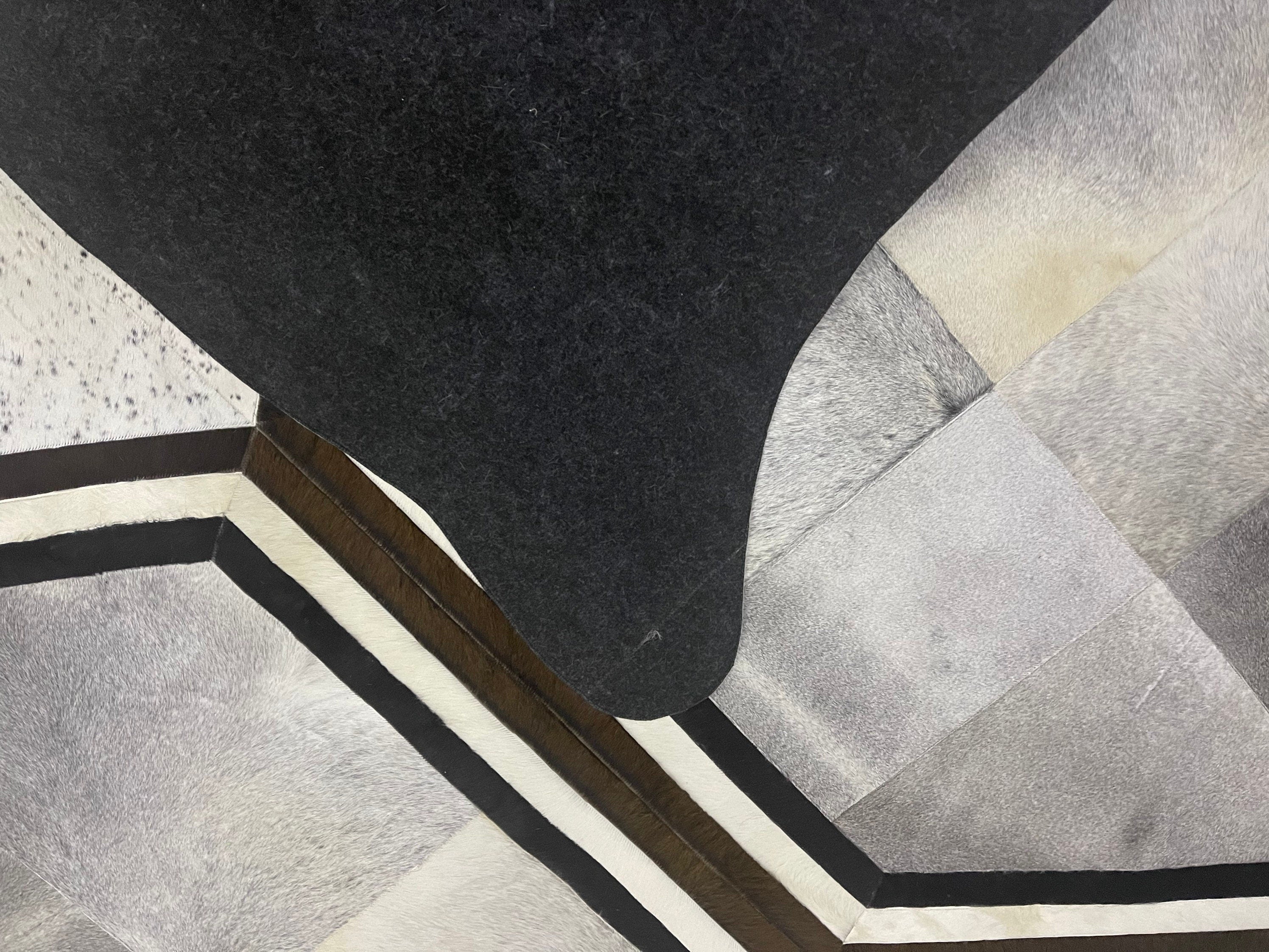 Cowhide Patch Rug ins the shape of real Brazilian cowhide shape designer cowhide patch rug . 115" x 96"