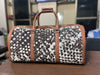 Cowhide Duffel/Hand Bags